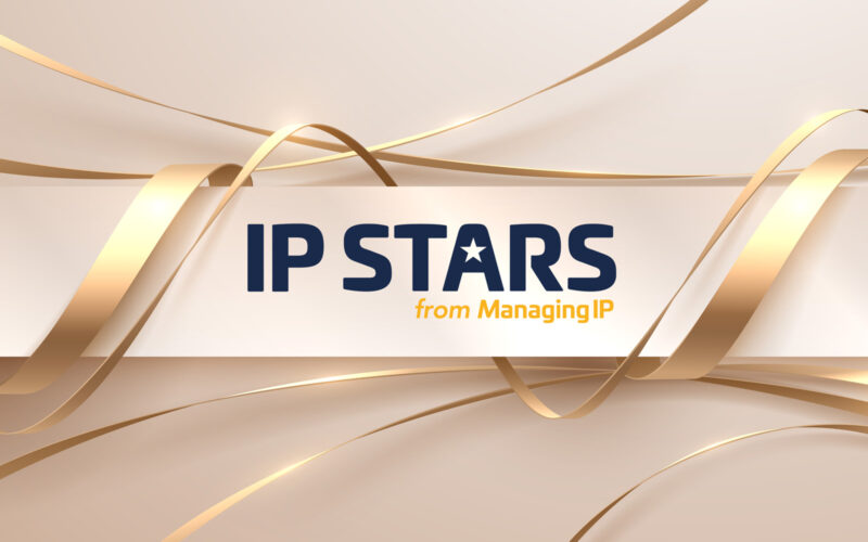 Light grey background, golden lines and IP Stars-logo